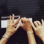 Hands at the Vietnam Wall